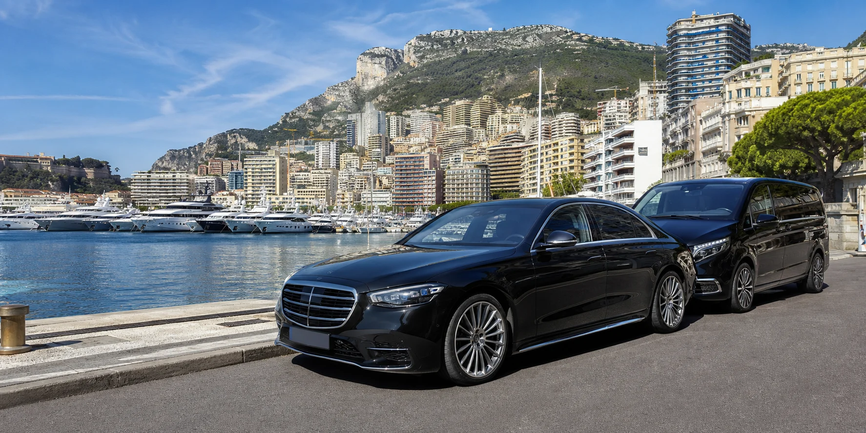 Luxury Mercedes-style chauffeur fleet beside Port Hercule in Monaco