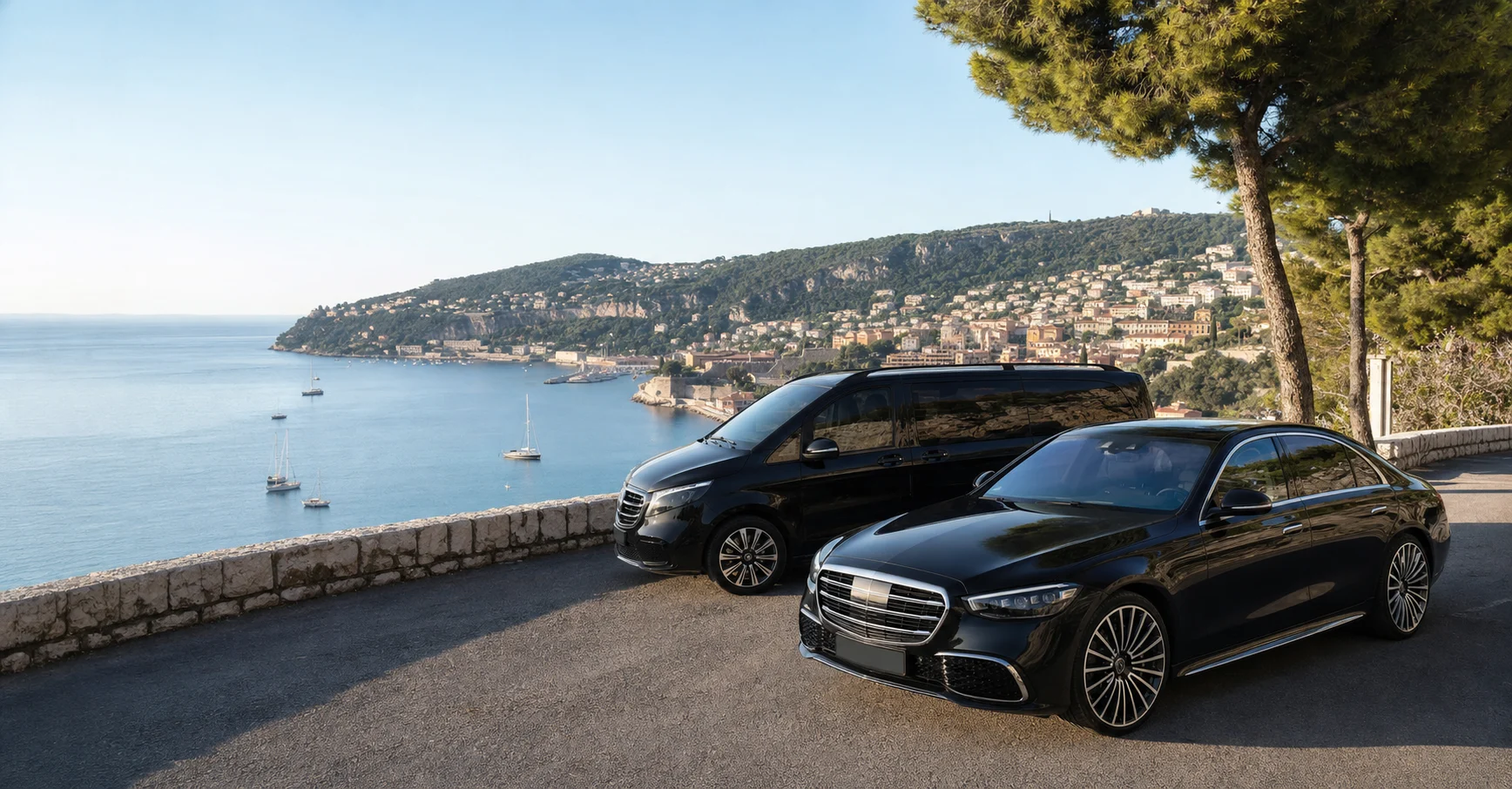 Luxury Mercedes-style chauffeur fleet overlooking Villefranche-sur-Mer bay